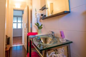 a bathroom with a sink in a room at Maja Apartment Cavtat II in Cavtat +42 photos