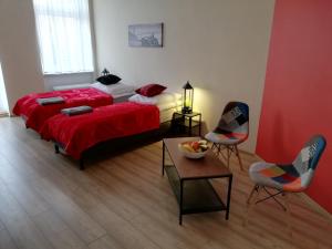 Posteľ alebo postele v izbe v ubytovaní Apartament Miarki