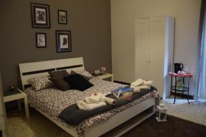 A bed or beds in a room at B&B RESTO AL SUD