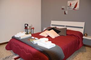 A bed or beds in a room at B&B RESTO AL SUD