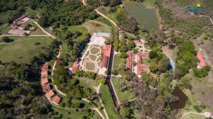 an aerial view of an estate with a river at Hotel Termópolis in São Sebastião do Paraíso