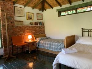 Ein Bett oder Betten in einem Zimmer der Unterkunft La Trini