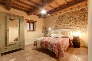 Letto o letti in una camera di Podere Vignola