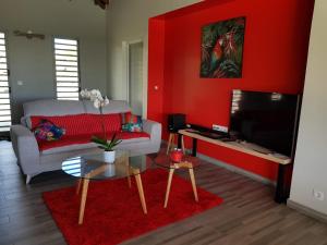 Et tv og/eller underholdning på Résidence Eden Océan avec vue mer