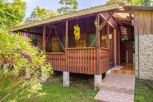 Garður fyrir utan Cabinas Iguana Cahuita