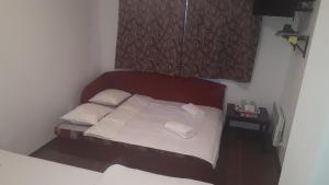 Ένα ή περισσότερα κρεβάτια σε δωμάτιο στο Ubytovanie - súkromie v meste (2) +3 φωτογραφίες