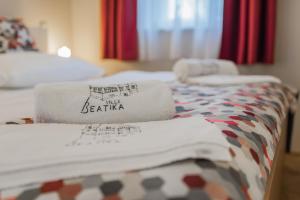 Posteľ alebo postele v izbe v ubytovaní Boutique Hotel Villa Beatika