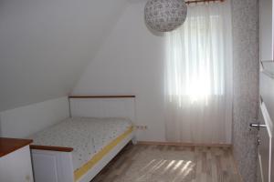 Postel nebo postele na pokoji v ubytování Nature,sandy beach nearby,hot tube,3 km from Pärnu