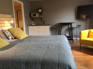 Postel nebo postele na pokoji v ubytování Hotel Falun