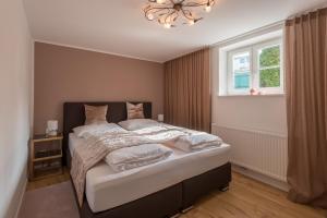 Postel nebo postele na pokoji v ubytování Apartment Villa Leopoldskron