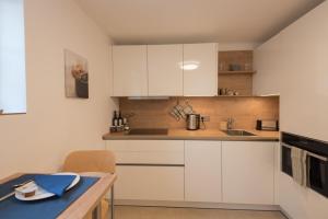 Kuchyň nebo kuchyňský kout v ubytování Apartment Villa Leopoldskron