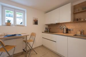 Kuchyň nebo kuchyňský kout v ubytování Apartment Villa Leopoldskron