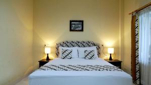 Voodi või voodid majutusasutuse Diana Hotel Jogja toas