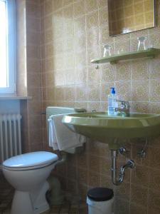 Koupelna v ubytování Gästehaus Alpenland