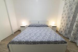 Кровать или кровати в номере La Dimora di Ares