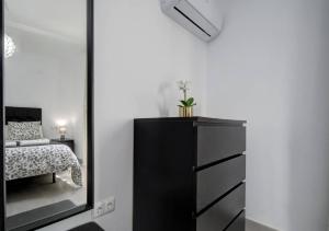 Łóżko lub łóżka w pokoju w obiekcie Apartamentos Villa Serali Parking Gratis