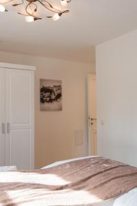 Postel nebo postele na pokoji v ubytování Apartment Villa Leopoldskron