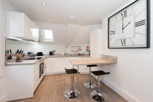 Kuchyň nebo kuchyňský kout v ubytování Franklin Rise by Harrogate Serviced Apartments