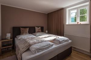 Postel nebo postele na pokoji v ubytování Apartment Villa Leopoldskron