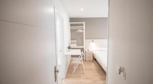 Posteľ alebo postele v izbe v ubytovaní Happy Hostal Carrales