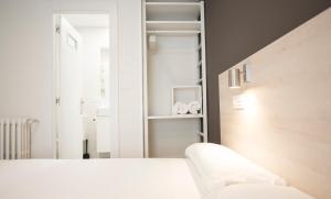 Posteľ alebo postele v izbe v ubytovaní Happy Hostal Carrales