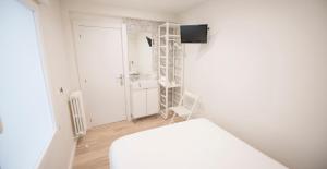 Posteľ alebo postele v izbe v ubytovaní Happy Hostal Carrales
