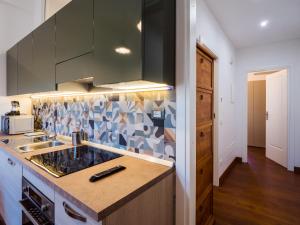 Kuchyň nebo kuchyňský kout v ubytování B&B VILLA TOZZA