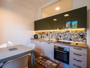 Kuchyň nebo kuchyňský kout v ubytování B&B VILLA TOZZA