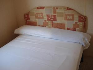 Posteľ alebo postele v izbe v ubytovaní Camping Valle Niza Playa