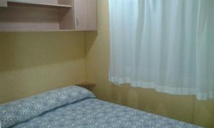 Posteľ alebo postele v izbe v ubytovaní Camping Valle Niza Playa