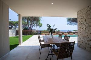 A patio or other outdoor area at VILLA GALI
