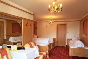 Postel nebo postele na pokoji v ubytování Hotel Purner