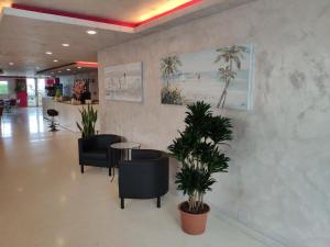 The lobby or reception area at Hotel Caesar