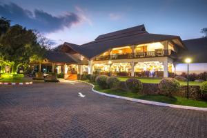 a large building with a lot of lights on at The Imperial Mae Hong Son Resort in Mae Hong Son