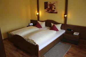 Katil atau katil-katil dalam bilik di Hotel Lamm