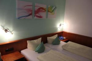 Katil atau katil-katil dalam bilik di Hotel Lamm