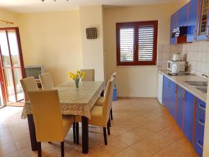 Kuchyň nebo kuchyňský kout v ubytování Apartments Sunny Side Orebić