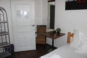 Postel nebo postele na pokoji v ubytování Hotel Praha Club bed & breakfast
