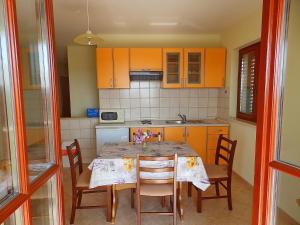 Kuchyň nebo kuchyňský kout v ubytování Apartments Sunny Side Orebić