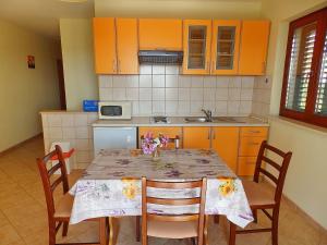 Kuchyň nebo kuchyňský kout v ubytování Apartments Sunny Side Orebić