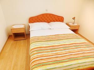 Postel nebo postele na pokoji v ubytování Apartments Sunny Side Orebić