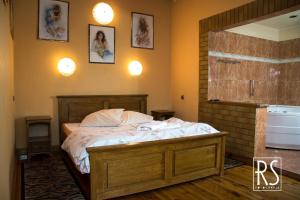 Łóżko lub łóżka w pokoju w obiekcie Hotel Azyl