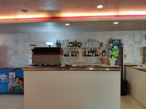 The lounge or bar area at Hotel Caesar