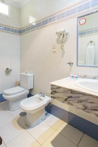 Een badkamer bij Hotel España