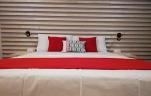 A bed or beds in a room at Le Mangiatoie del Cavaliere