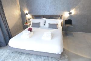 Posteľ alebo postele v izbe v ubytovaní suite28