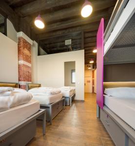 A bed or beds in a room at Generator Venice