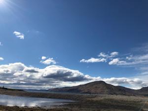 a body of water with mountains in the background at Skye View in Glenelg