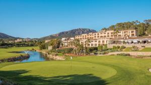 a view of the golf course at a resort at Steigenberger Hotel and Resort Camp de Mar in Camp de Mar