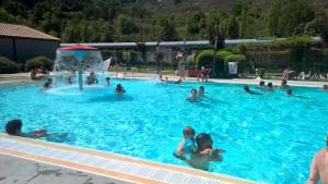 a group of people in a swimming pool at Stunning view in Cathar country in Cailla
